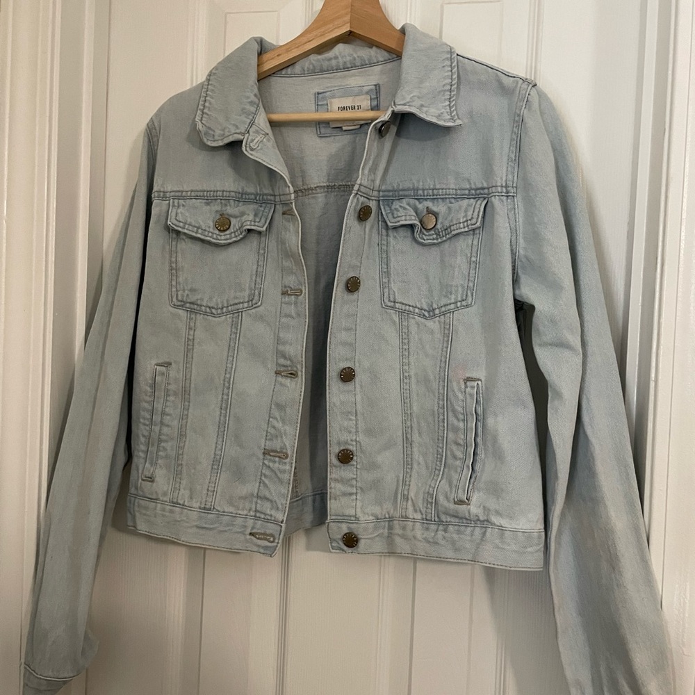 size medium light blue denim jacket from Forever 21, worn only twice.